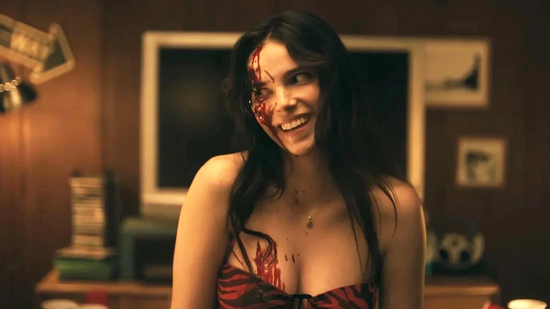 A bloody Nikki with a disturbing smile on her face in Obsession